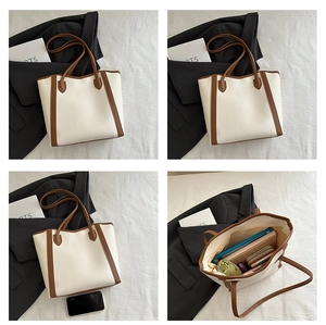Detailed interior of a beige tote bag showing large capacity for daily essentials