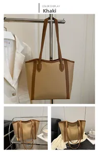 Detailed views of khaki and brown color-block tote bag for daily fashion commuting
