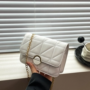 Minimalist white quilted square crossbody bag with gold chain strap for women