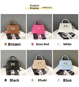 Detail view showing six elegant colors of the bow-tie square handbag on a stylish setting
