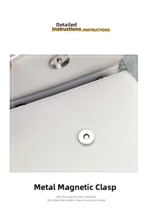 Macro detail of silver magnetic clasp on white bow shoulder bag with fine stitching