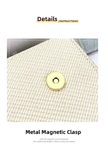 Close-up of golden circular magnetic buckle on a beige woven textured handbag