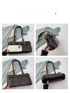Detailed views of dark brown faux leather underarm bag with decorative belt buckle and flat base