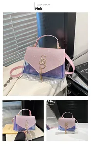 Detail of pink glitter flap bag with golden SS logo and elegant purple quilted inner pouch