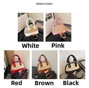 Selection of straw woven shell bags in white, pink, red, brown, and black colors