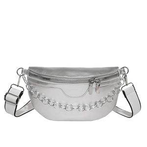 Silver metallic saddle bag with chunky chain and adjustable fabric strap in a modern design