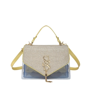 Retro glitter and blue PVC crossbody bag with large gold SS logo and chain fringe
