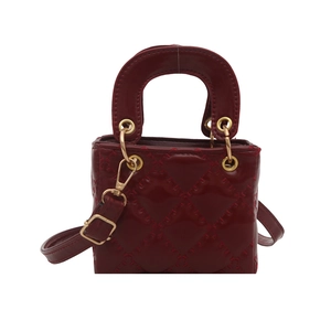 Classic wine red quilted handbag with patent finish and gold hardware in crossbody style
