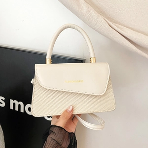 Chic beige crossbody bag with leather and woven textures featuring a top handle