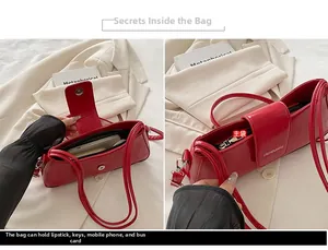 Interior view showing the main compartment and large capacity of this red leather bag