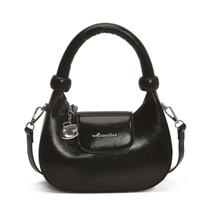 Black crescent moon leather handbag with silver G-pendant and shoulder strap