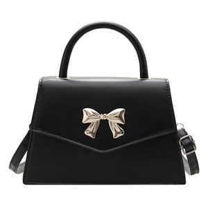 Black faux leather crossbody bag with silver bow accent and top handle for women