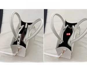 Detailed interior of vintage crossbody bag showing capacity for phone and wallet