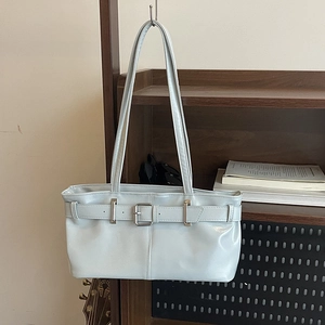 Minimalist light blue faux leather underarm bag with decorative metal buckle and dual straps
