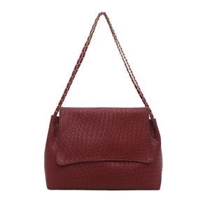 Elegant red woven leather crossbody bag with golden chain strap for 2025 fashion