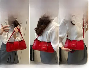Three-way carry view of red glossy patent leather shoulder bag with adjustable strap
