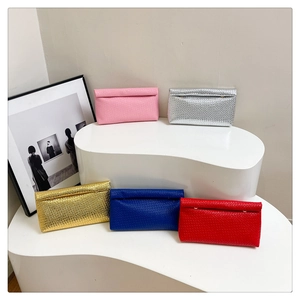 Collection of woven textured envelope clutches in pink, silver, gold, blue, and red colors