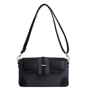 Minimalist black and grey baguette shoulder bag with stylish leather patchwork and gold metal