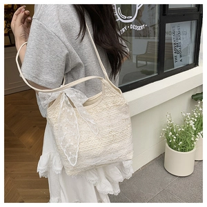 Sac fourre-tout en dentelle ajourée avec un nœud décoratif élégant sur le côté du sac