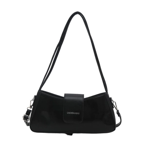 Minimalist black rectangular underarm bag in glossy PU leather with flap closure