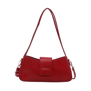 Glossy red patent leather underarm shoulder bag with minimalist rectangular flap design