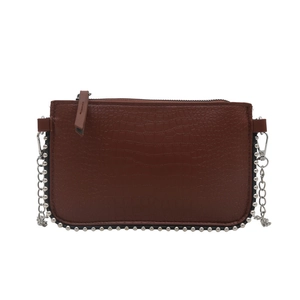 Dark brown faux leather crossbody bag with crocodile pattern and silver rivet trim