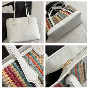 Détail du sac fourre-tout en paille tissée avec coutures en simili cuir et zip