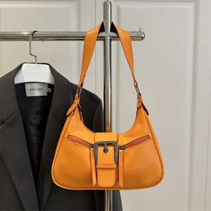 Retro orange crescent shoulder bag with metallic buckle and dual zipper pockets for women