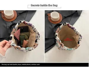 Internal view of a printed bucket bag showing capacity for phone and cosmetics