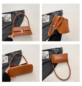 Detail view of brown leather underarm bag with gold metal clasp from multiple angles