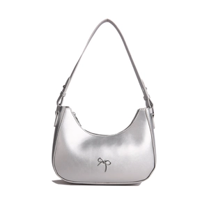 Chic silver metallic crescent hobo bag with a decorative metal bow and shoulder strap