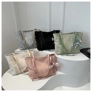 Tote bags set in five colors featuring pleated texture fabric and silk scarf handle detail