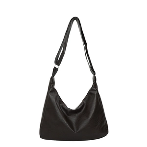 Minimalist black PU leather Hobo tote bag with wide shoulder strap on white background