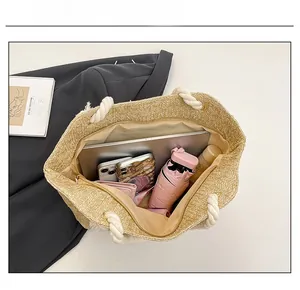 Top view of large straw tote bag showing internal capacity with daily essentials