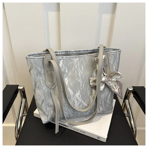 Silver-grey marble textured large tote bag with silk scarf on black chair