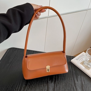 Brown faux leather baguette shoulder bag with gold square buckle and minimalist retro design