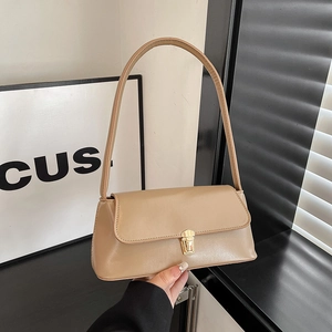 Minimalist beige baguette shoulder bag with gold metal buckle for women in 2025 fashion