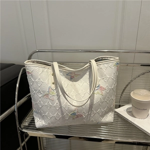 Grande borsa tote bianca con ricamo a farfalla colorata e tessuto con trama a rilievo