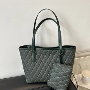 Deep green quilted rhombus tote bag set with matching pouch for women in a stylish setting