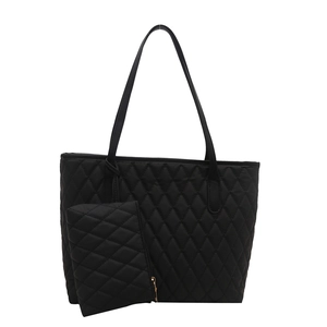 Grand sac cabas matelassé noir élégant avec petite pochette zippée et fines bandoulières