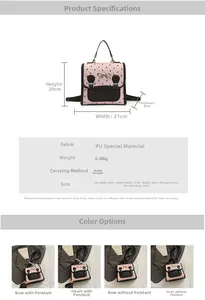 Detailansicht eines pink-schwarzen Rucksacks mit Herzmuster und Größenangaben