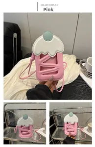 Detail of pink ice cream shaped crossbody phone bag with hollow design and slim strap
