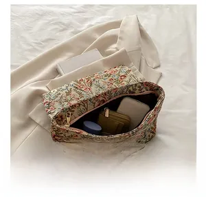 Floral canvas bag interior showing large capacity for wallet and daily essentials