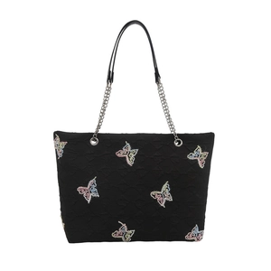 Fashionable black tote bag with butterfly embroidery and silver chain shoulder strap