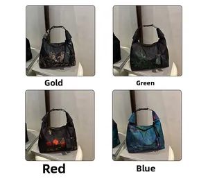 Artistic tote bags in four floral patterns shown with stylish knotted handle detail