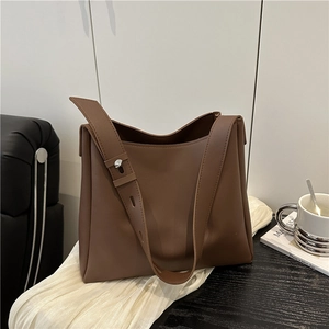 Minimalist brown matte leather large tote bag for women with wide shoulder strap decoration