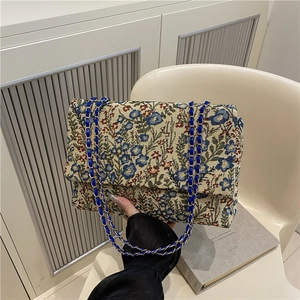 Ethnic style floral embroidery underarm bag with blue chain strap and vintage jacquard pattern
