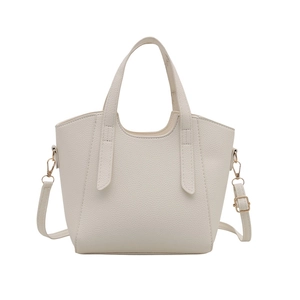 Minimalist creamy white lychee grain leather bucket tote with gold hardware and strap