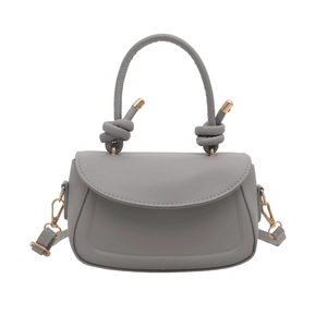 Grey minimalist square crossbody bag with knot handle and golden metal hardware