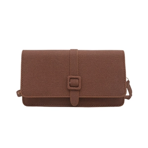Sac bandoulière vintage marron foncé avec une finition tissée texturée
